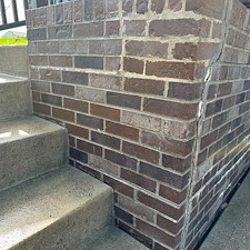 Years-of-Dirt-and-Algae-Washed-off-of-Brick 1